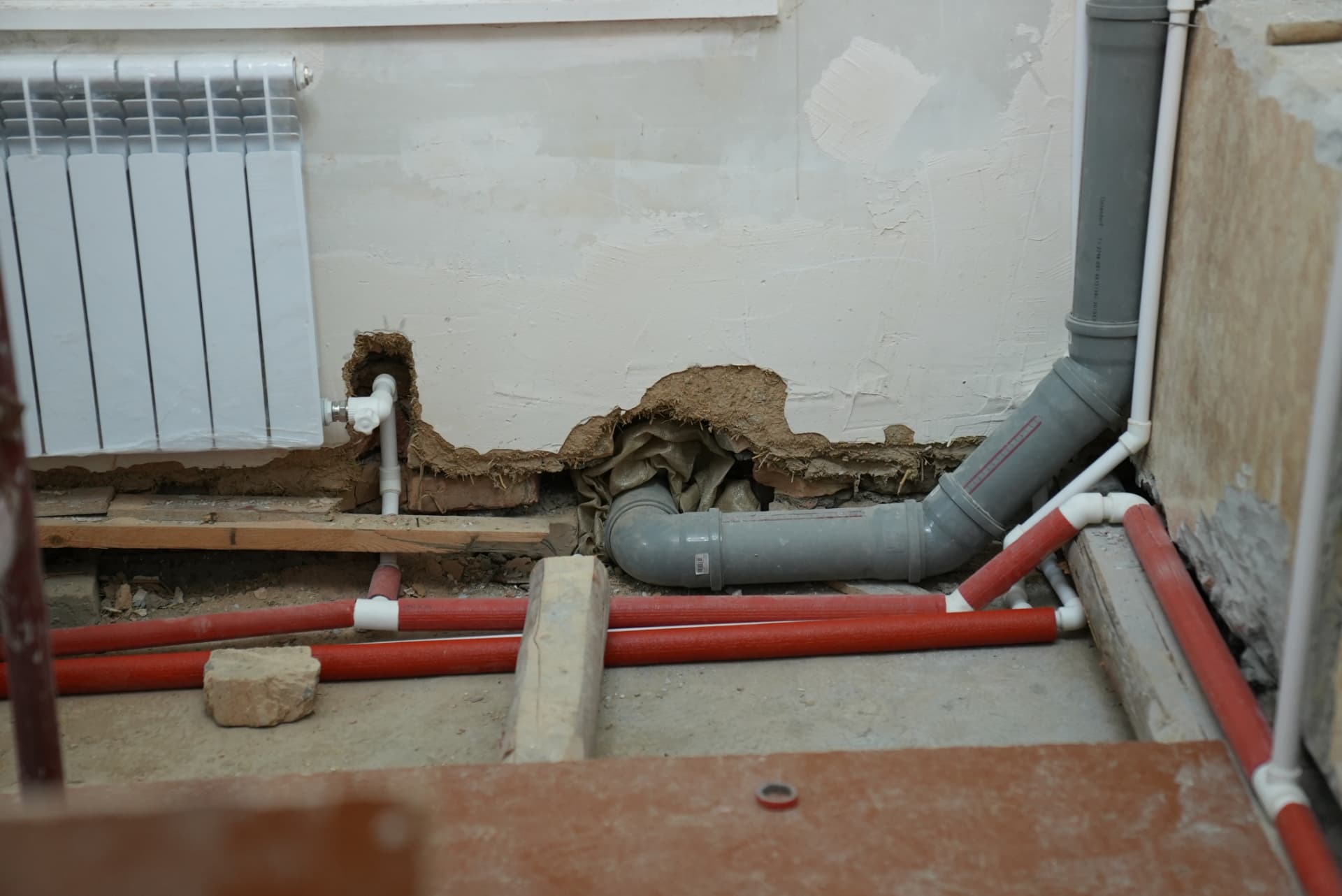New water and heating pipes at floor level